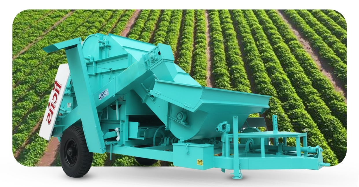 Yogi Agro Industries thresher machine in a farm field